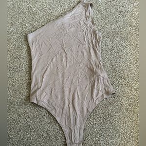 Tan one shoulder bodysuit